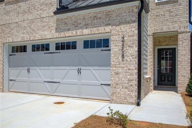 Garage with concrete driveway