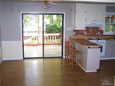 An area for your kitchen table plus the bar area.