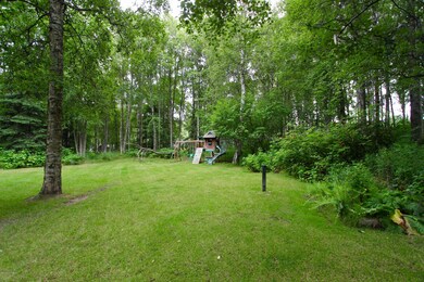 Back yard w/ playset-summer