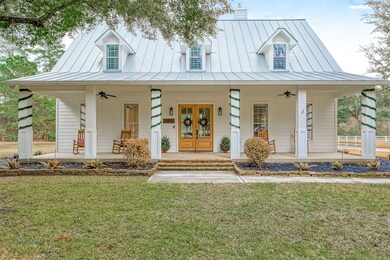 Crisp white columns add to the CURB APPEAL