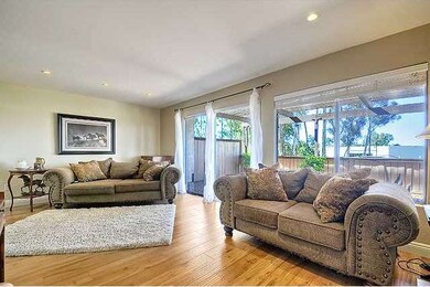 Another view of living room with view out towards 