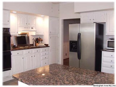 Granite counter tops, double ovens and separate co