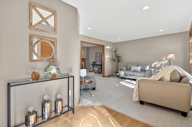 Nice sized foyer with transitional rooms on either side that could be used as office, living, dining or playroom.