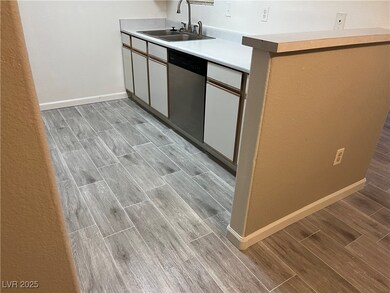 Kitchen featuring a sink, stainless steel dishwash