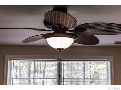 The ceiling fans and light fixtures found througho