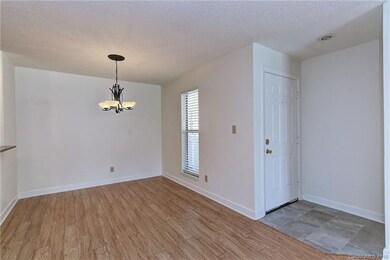 Foyer with new and upgraded custom tile and Pergo 
