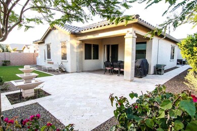 Back Patio with Fountain and Travertive