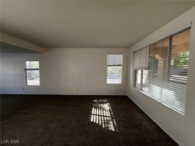Empty room featuring a healthy amount of sunlight,