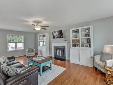 Large Family Room with hardwood floors, gas firepl