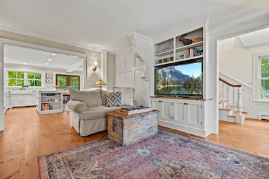 the kitchen flows nicely into the living room help