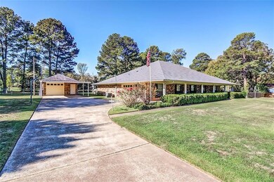 Paved driveway to the side entrance and the covere