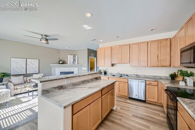 Kitchen featuring appliances with stainless steel 
