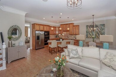 Crisp white moldings frame the fresh color palette