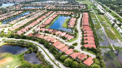 View of property location featuring nearby suburban area and a large body of water