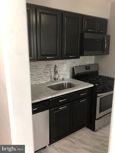 6127 Chinquapin Pkwy unit 2, Baltimore, MD 21239 - photo 4