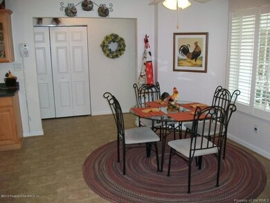 Breakfast Nook overlooks screened Porch