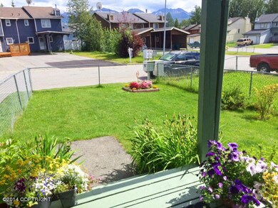 Fenced landscaped lawn