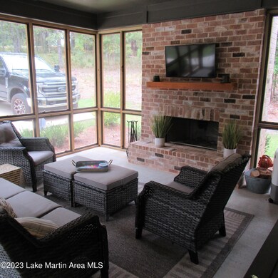 Screenporch w wood burning fireplace