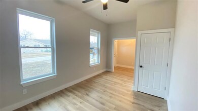 Unfurnished bedroom with light wood-type flooring,