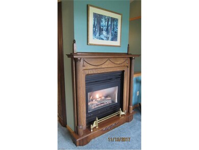 The Other Side of the Fireplace Serves the Sunroom