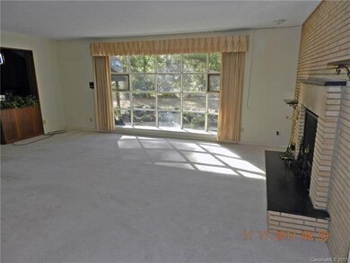 Bay window and fireplace in living room