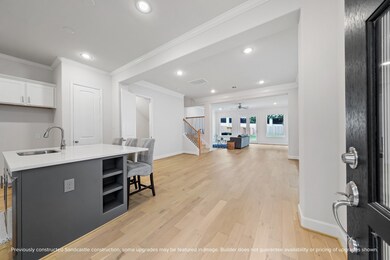 Step through the majestic 8-foot wood and glass fr
