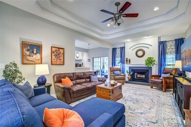 Spacious living room with wood burning fireplace