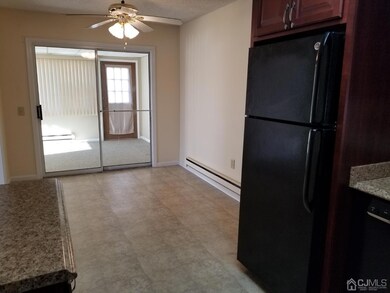 Dining area with sliders to Florida room