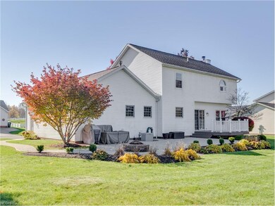 The deck and patio area, with a firepit, is sensat
