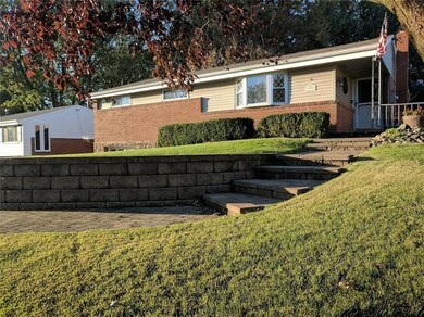 Front steps to covered entrance shows new professi