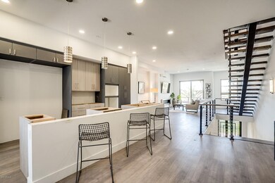 Kitchen toward living room and patio