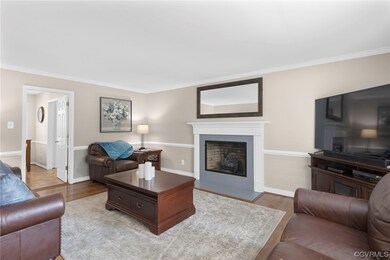 The Family Room beckons you to relax in front of a cozy fire