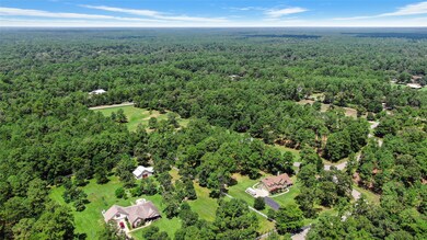 Wow! Look at this absolutely breathtaking view of this wonderful home and the acreage that surrounds it. The view is spectacular! Who would not love to come home to this beauty!