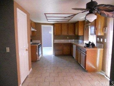 Kitchen andd Eat-In Area With Slider to Back Yard