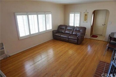 Formal hardwood floor living room with fireplace