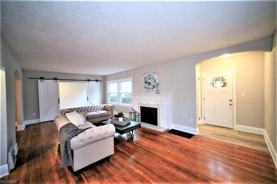 * (Front Entrance to the Right) LIVING ROOM w/Awes