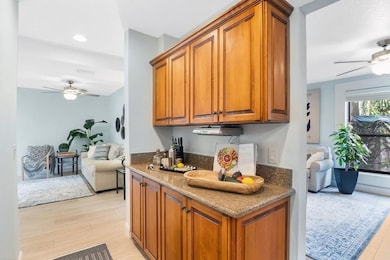 Kitchen/Bar area, front Living space to left, main living space to right