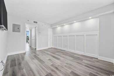 Empty room featuring hardwood / wood-style floors 