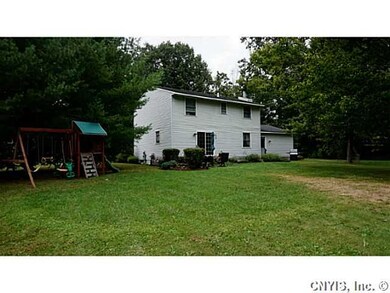 Exterior Back Over an acre of land to roam!