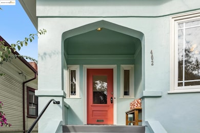 View of exterior entry with stucco siding