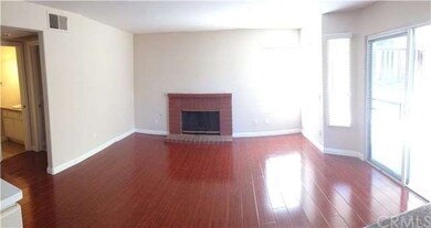 Spacious and Bright Family Room with Cozy Fireplac