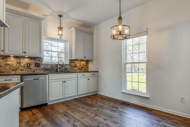 Eat-in kitchen with a fabulous view of the backyard. 