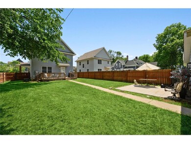 privacy fenced yard with Deck and Patio