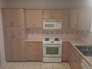 Custom cabinets with architectural knobs for easy 