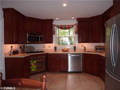 Kitchen - Updated kitchen with newer cherry cabine