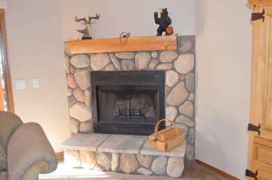 Cozy up to the wood burning fireplace