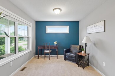 This flex space is the first room upon entry. Large window with piano window make this space bright, even on a gloomy day.