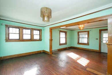 Large living/dining rooms with beautiful oak woodw