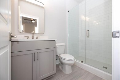 The lower-level bedroom includes easy access to a 