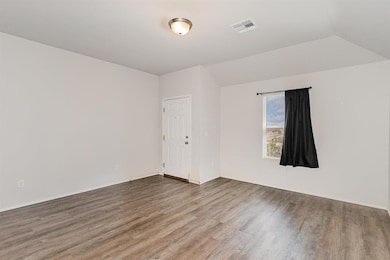 Living room view towards front door.